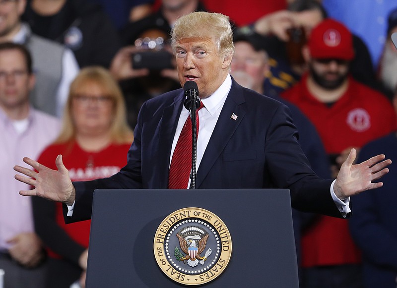 
              President Donald Trump speaks at the American Center for Mobility, Wednesday, March 15, 2017, in Ypsilanti Township, Mich. (AP Photo/Paul Sancya)
            