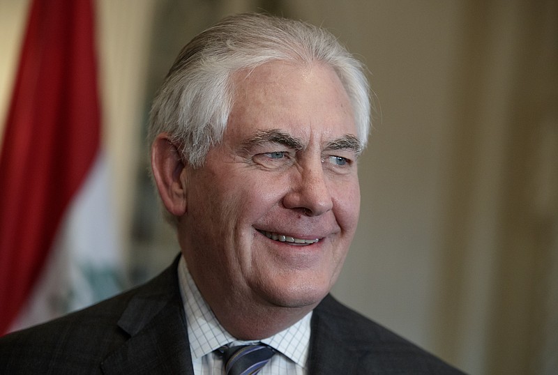 
              FILE- In this March 10, 2017, file photo, Secretary of State Rex Tillerson smiles during a meeting with Iraqi Minister of Oil Jabar Ali al-Luaibi at the State Department in Washington. The conservative-leaning website, the Independent Journal Review, said late Tuesday, March 14, that IJR reporter Erin McPike is the lone journalist traveling with Tillerson on his tour to Japan, South Korea and China. (AP Photo/J. Scott Applewhite, File)
            