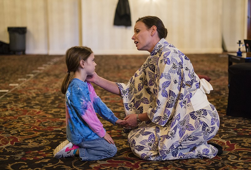 Shannon Kessler Dooley, right, plays Madame Butterfly and Willa Grace Hansard plays her son Sorrow during a rehearsal in the Read House's Terrace Ballroom for the Chattanooga Symphony and Opera's production of Madame Butterfly on Wednesday, March 15, 2017, in Chattanooga, Tenn.