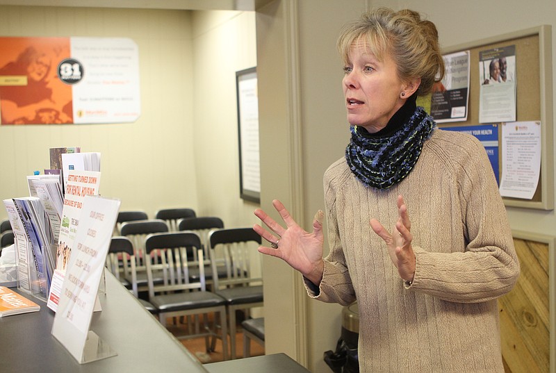 Rebecca Whelchel, director of Metropolitan Ministries, speaks to a Times Free Press employee in this file photo