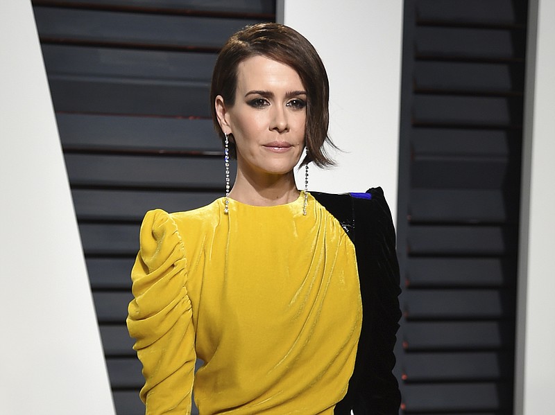 
              FILE - In this Feb. 26, 2017 file photo, actress Sarah Paulson arrives at the Vanity Fair Oscar Party in Beverly Hills, Calif. Fresh off her SAG, Golden Globe and Emmy Award wins for playing Marcia Clark in “American Crime Story,” Paulson is celebrating the woman who put together all those red carpet looks: Karla Welch, whom the Hollywood Reporter just named the industry’s most powerful stylist. Though Paulson prefers leisurewear, she loves the ritual of getting ready for the red carpet. Having a spectacular dress to wear helps her achieve the right mindset for a million flashbulbs and screaming fans. (Photo by Evan Agostini/Invision/AP, File)
            