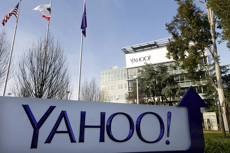 
              FILE - This Jan. 14, 2015, file photo shows a sign outside Yahoo's headquarters in Sunnyvale, Calif. In an indictment Wednesday, March 15, 2017, announcing charges against four Russians, U.S. officials describe how Russian hackers working with Russian intelligence officials broke into Yahoo’s network, stole information on Yahoo user accounts and ultimately gained entry into other services used by individuals they were targeting. (AP Photo/Marcio Jose Sanchez, File)
            