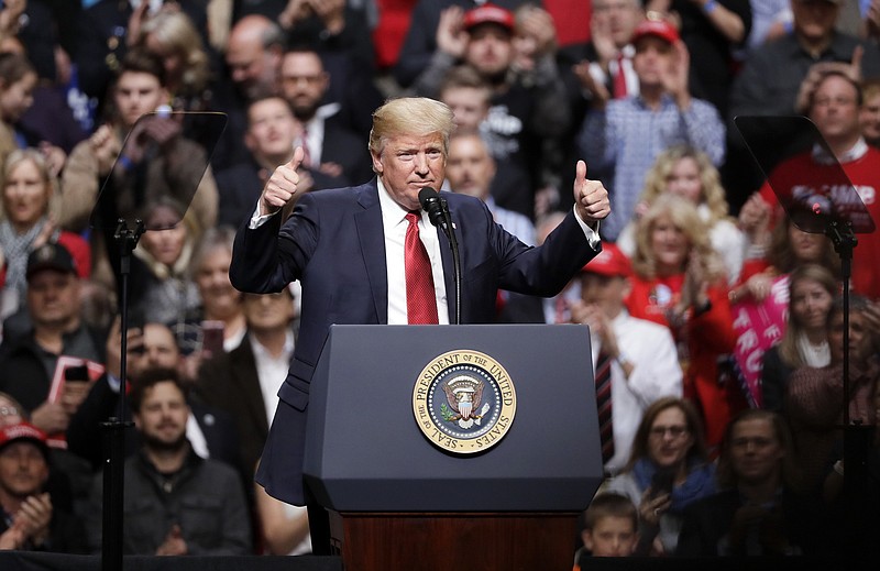 
              President Donald Trump speaks at a rally Wednesday, March 15, 2017, in Nashville, Tenn. (AP Photo/Mark Humphrey)
            