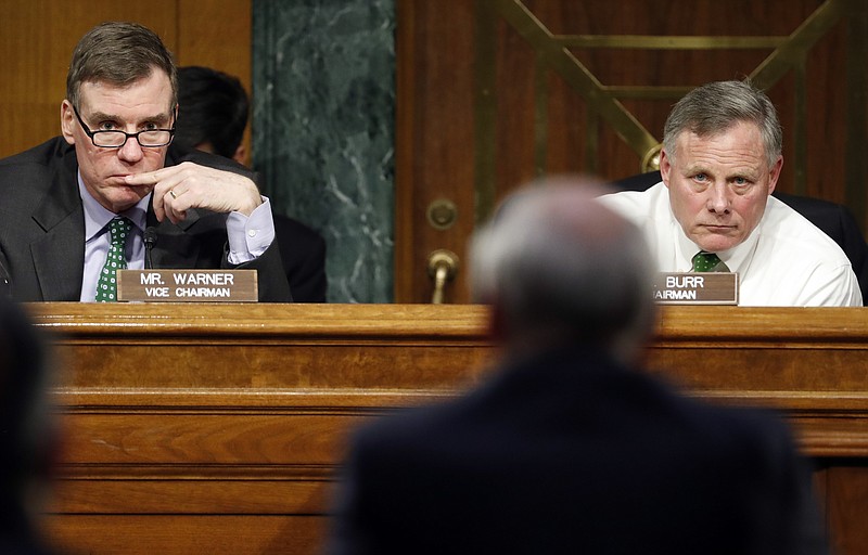 
              FILE - In this Feb. 28, 2017 file photo, Senate Intelligence Committee Chairman Richard Burr, R-N.C., right, and Committee Vice chairman Mark Warner, D-Va., left, listen on Capitol Hill in Washington as then-Director of National Intelligence-designate Dan Coats testifies at his confirmation hearing before the committee. There is no indication that Trump Tower was “the subject of surveillance” by the U.S. government before or after the 2016 election, the top two members of the Senate intelligence committee said Thursday, March 16, 2017, directly contradicting President Donald Trump’s claims.“Based on the information available to us, we see no indications that Trump Tower was the subject of surveillance by any element of the United States government either before or after Election Day 2016,” Sens. Richard Burr, R-N.C. and Mark Warner, D-Va., said in a one-sentence joint statement Thursday afternoon.  (AP Photo/Alex Brandon, File)
            