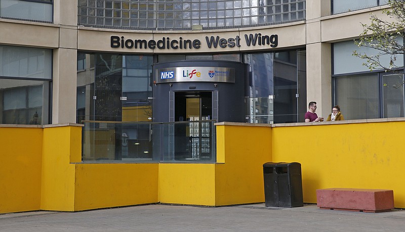 
              A general view of Newcastle Fertility Clinic, which is on the third floor of this building, in Newcastle, England, Thursday, March 16, 2017. Britain's Newcastle University says its scientists have received a license to create babies using DNA from three people to prevent women from passing on potentially fatal genetic diseases to their children — the first time such approval has been granted. (Owen Humphreys/PA via AP)
            