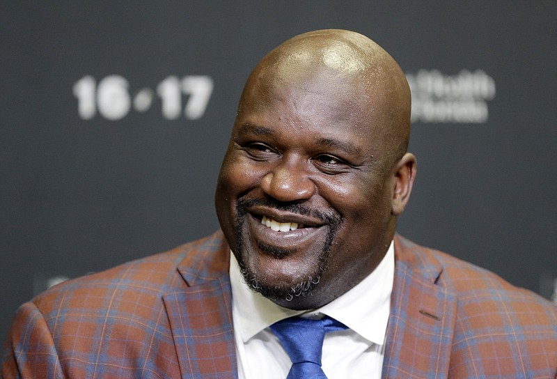 
              FILE - In this Dec. 22, 2016, file photo, retired Hall of Fame basketball player Shaquille O'Neal smiles as he talks to reporters during an NBA basketball news conference in Miami. WAGA-TV reported on March 16, 2017, that O'Neal bought new furniture for the family of a 5-year-old Atlanta girl who survived a dog attack that left another child dead. (AP Photo/Alan Diaz, File)
            