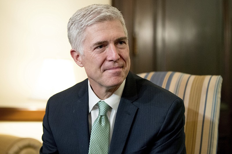 
              FILE - In this Feb. 14, 2017 file photo, Supreme Court Justice nominee Neil Gorsuch is seen on Capitol Hill in Washington. When Democrats question Gorsuch at his Senate confirmation hearing next week, they’ll probably ask a lot about something called “Chevron deference.” For the record, it is not about letting someone ahead of you in line at the gas station. But it is a legal concept Gorsuch has addressed as a judge on the 10th U.S. Circuit Court of Appeals in Denver since 2006. (AP Photo/Andrew Harnik, File)
            