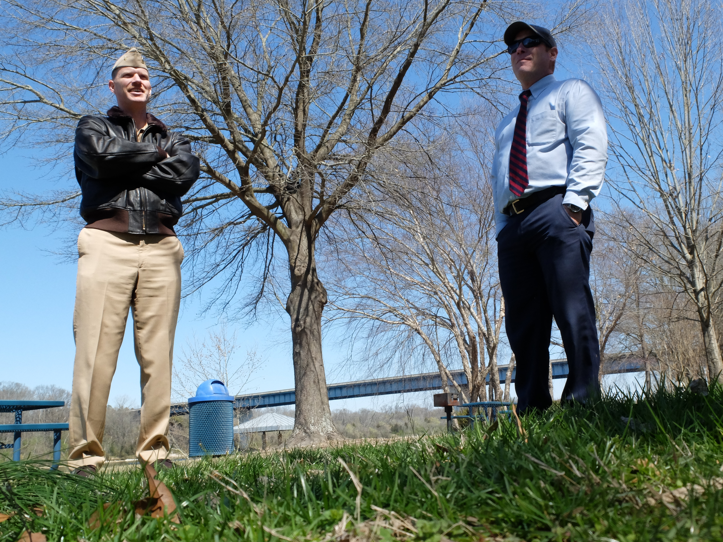 Lt. Cmdr Tim White, left, and Hamilton County Parks and Recreation Director Tom Lamb survey the possible location for a permanent July 16 memorial at the Tennessee Riverpark.