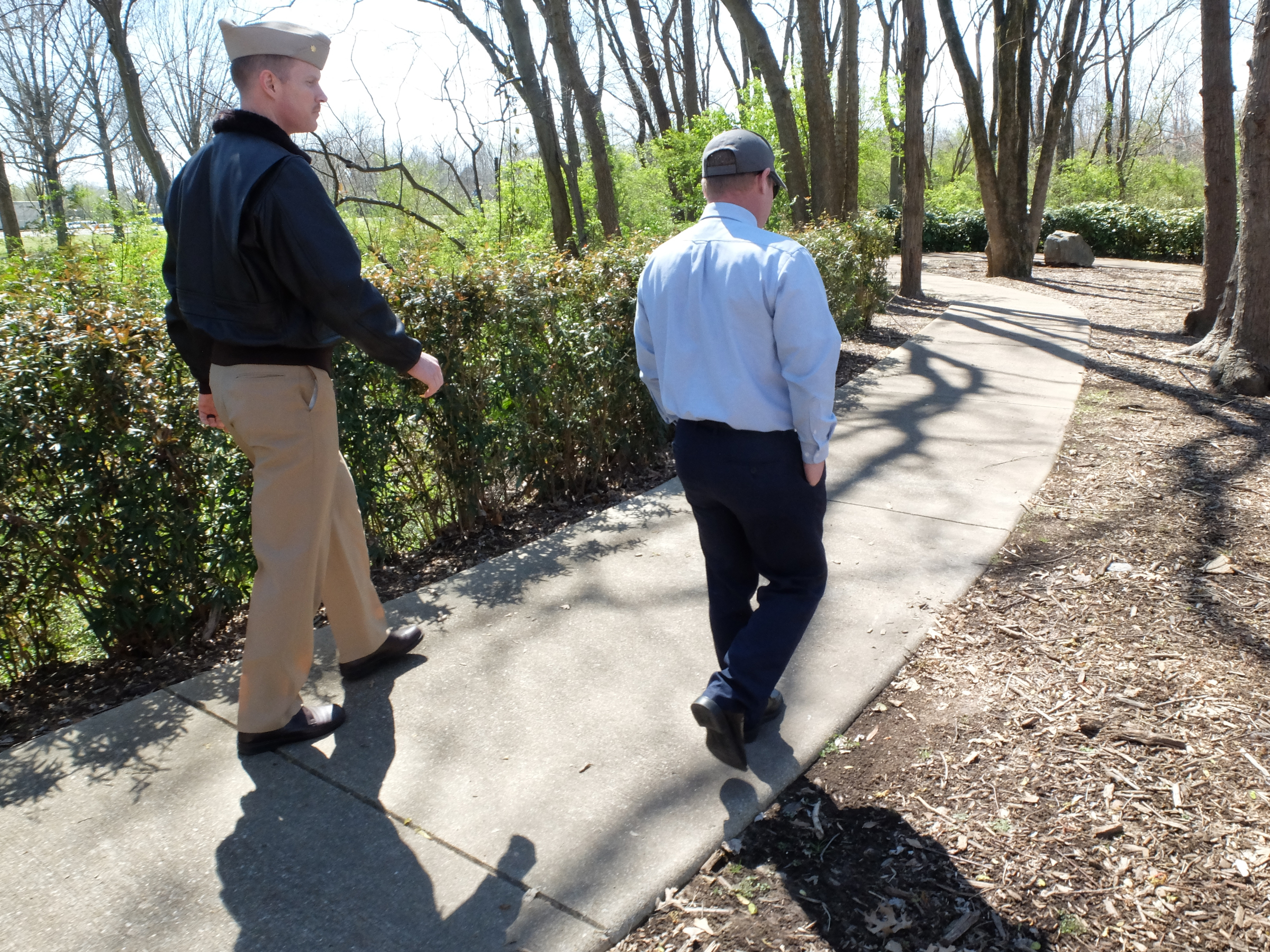 Lt. Cmdr Tim White, left, and Hamilton County Parks and Recreation Director Tom Lamb survey the possible location for a permanent July 16 memorial at the Tennessee Riverpark.