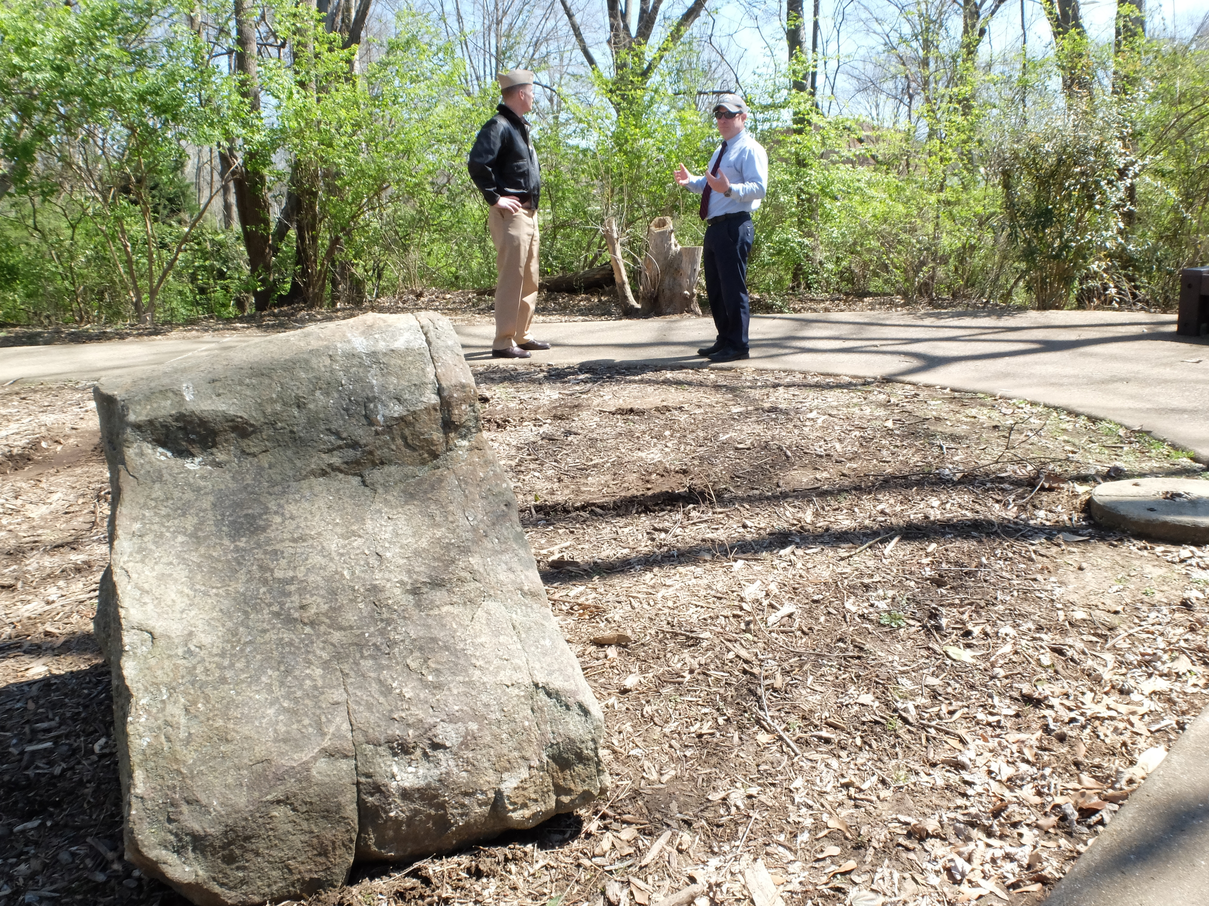 Lt. Cmdr Tim White, left, and Hamilton County Parks and Recreation Director Tom Lamb survey the possible location for a permanent July 16 memorial at the Tennessee Riverpark.