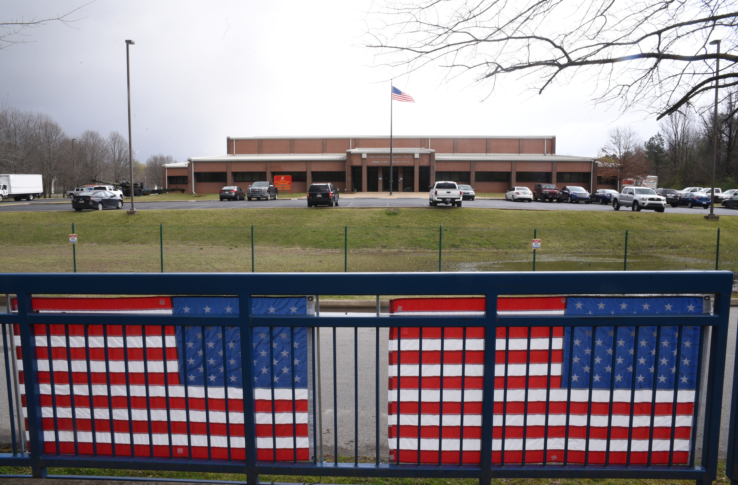 Five flags line the Tennessee Riverwalk Tuesday, March 14, 2017 in front of the Naval Reserve Center on Amnicola Highway.
