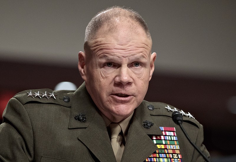 
              In this March 14, 2017, photo, Marine Corps Commandant Gen. Robert B. Neller speaks on Capitol Hill in Washington, while testifying before the Senate Armed Services Committee hearing on the investigation of nude photographs of female Marines and other women that were shared on the Facebook page "Marines United."  At least 20 victims have now come forward to complain that explicit photos of them are being shared online by active duty and retired members of the Marine Corps and others, a leading Navy investigator said March 17. (AP Photo/J. Scott Applewhite)
            