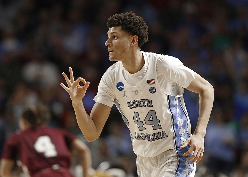 
              North Carolina's Justin Jackson (44) reacts after making a three-point basket against Texas Southern during the first half in a first-round game of the NCAA men's college basketball tournament in Greenville, S.C., Friday, March 17, 2017. (AP Photo/Chuck Burton)
            