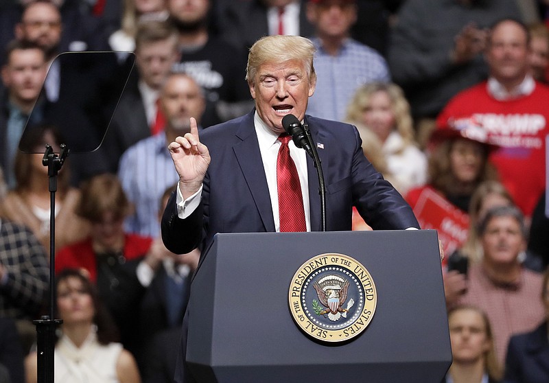 
              President Donald Trump speaks at a rally Wednesday, March 15, 2017, in Nashville, Tenn. (AP Photo/Mark Humphrey)
            