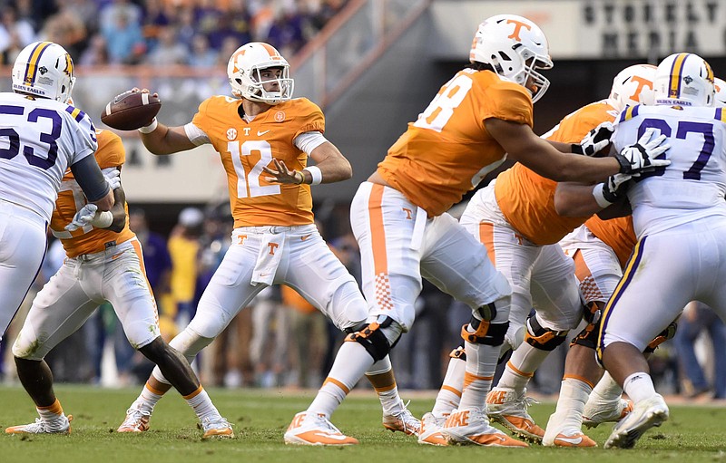 Tennessee quarterback Quinten Dormady (12) fires a pass behind ample protection against Tennessee Tech last November in Neyland Stadium. Dormady was the backup the past two seasons and now will compete for the starting job.