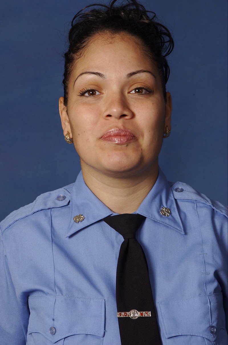 
              This undated photo provided by the Fire Department of New York shows FDNY emergency medical technician Yadira Arroyo. Police said the EMT in New York City died after she was run over Thursday, March 16, 2017, by her own ambulance that had just been stolen. (Fire Department of New York via AP)
            