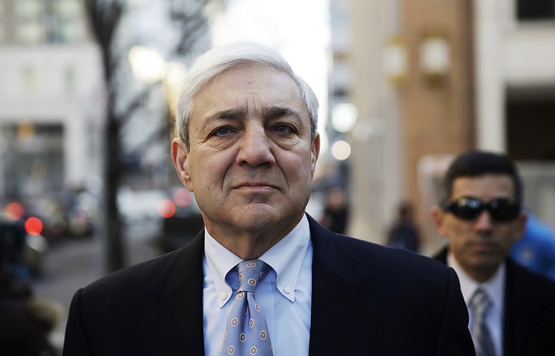 
              Former Penn State president Graham Spanier walks to the Dauphin County Courthouse in Harrisburg, Pa., Monday, March 20, 2017. Spanier faces charges that he failed to report suspected child sex abuse in the last remaining criminal case in the Jerry Sandusky child molestation scandal. (AP Photo/Matt Rourke)
            