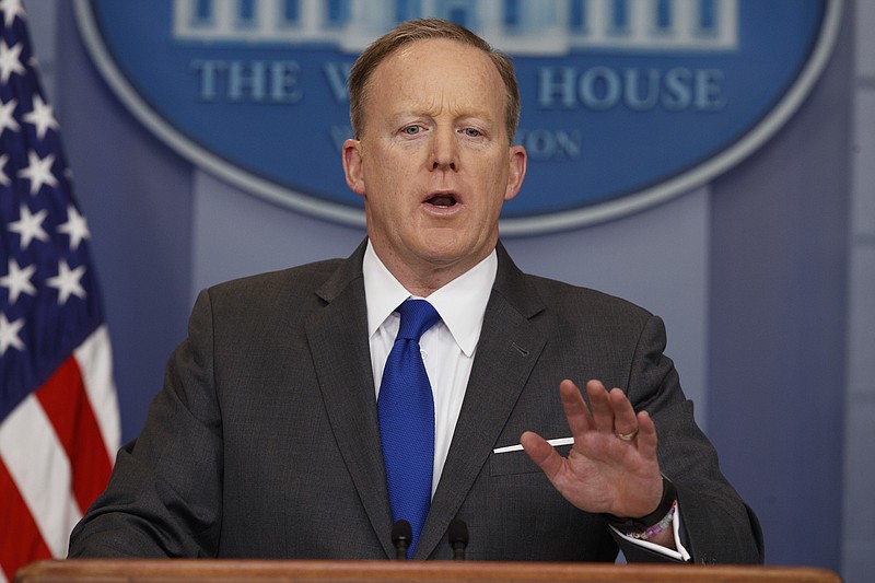 
              White House press secretary Sean Spicer speaks during the daily press briefing at the White House in Washington, Monday, March 20, 2017. (AP Photo/Evan Vucci)
            