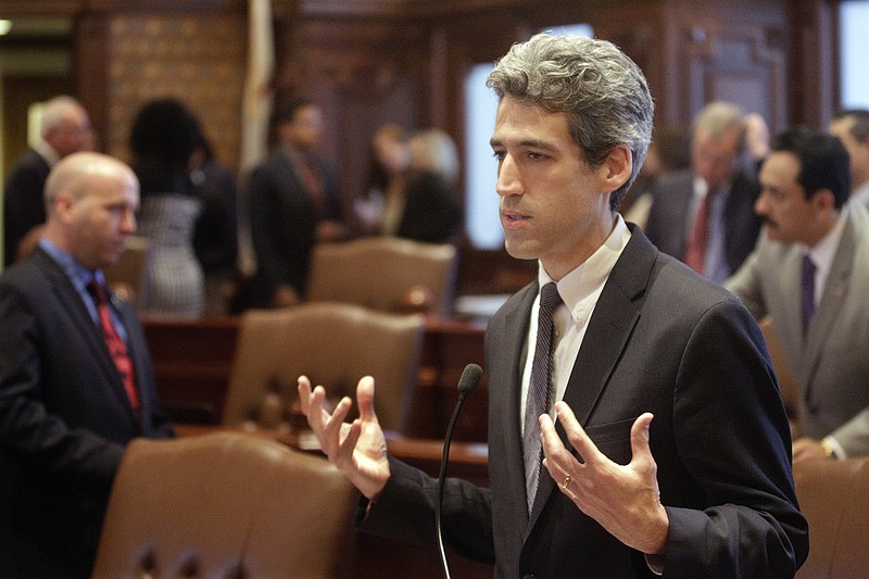 
              FILE - in this Nov. 15, 2016 file photo, Illinois Sen. Daniel Biss, D-Skokie, speaks to lawmakers while on the Senate floor at the Illinois State Capitol in Springfield, Ill. In a live video event Monday, March 20, 2017, Biss said he's running for Illinois governor in 2018. He becomes the latest Democrat to say he's seeking the nomination to challenge Republican Gov. Bruce Rauner. (AP Photo/Seth Perlman file)
            