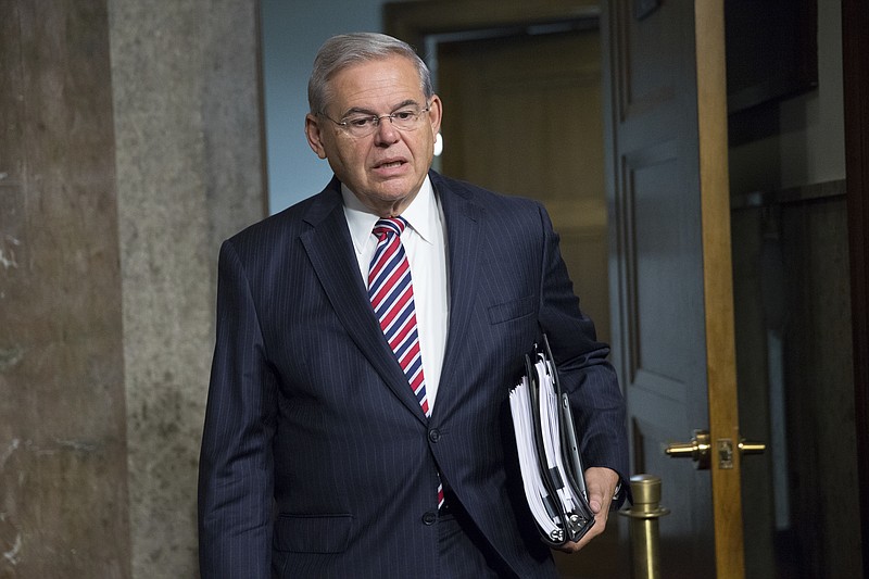 
              In this photo taken July 23, 2015, Sen. Bob Menendez, D-N.J. is seen on Capitol Hill in Washington. The U.S. Supreme Court on Monday, March 20, 2017, declined to hear Menendez's appeal of his corruption indictment, setting the stage for a federal trial in the fall. The justices let stand a lower court ruling that refused to dismiss charges including conspiracy, bribery and fraud against the Democratic lawmaker.  (AP Photo/Andrew Harnik)
            