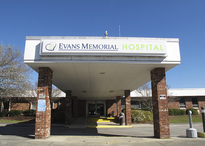 
              This Thursday, March 9, 2017, photo shows the main entrance to Evans Memorial Hospital in Claxton, Ga. Like many other rural hospitals in the U.S., Evans Memorial has struggled to keep its doors open while treating patients who tend to be older, poorer and often uninsured. (AP Photo/Russ Bynum)
            