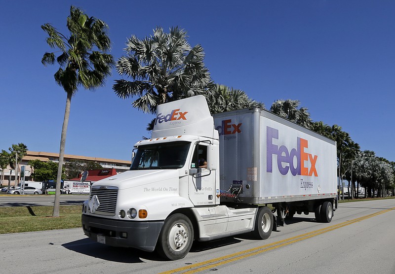 
              This Tuesday, Jan. 24, 2017, photo shows a FedEx truck in Miami. FedEx Corp. reports quarterly results after the stock market closes, Tuesday, March 21, 2017. (AP Photo/Alan Diaz)
            
