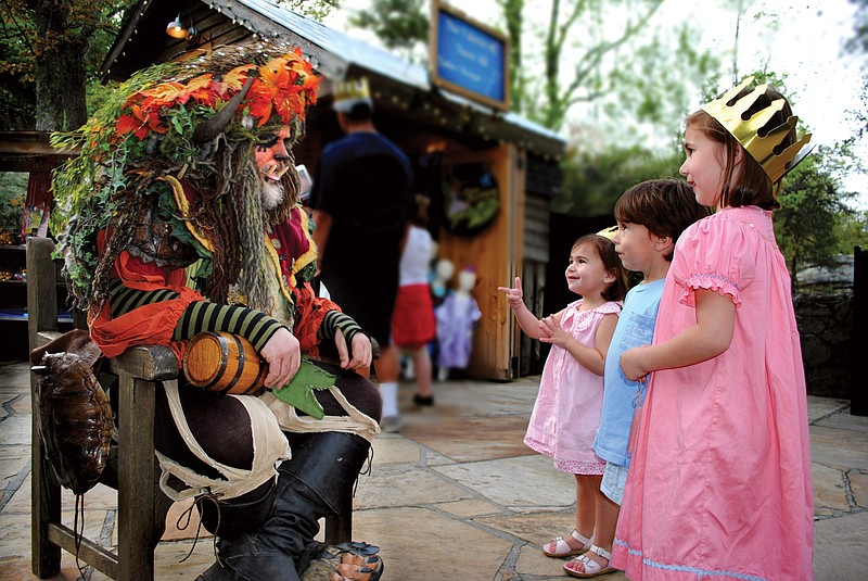 Children greet the Troll King at Fairytale Nights. (Photo contributed by Rock City)