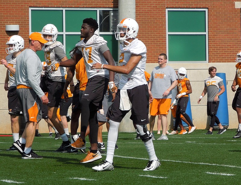 Jarrett Guarantano (2) realizes he's alwasy being watched as a Tennessee quarterback.