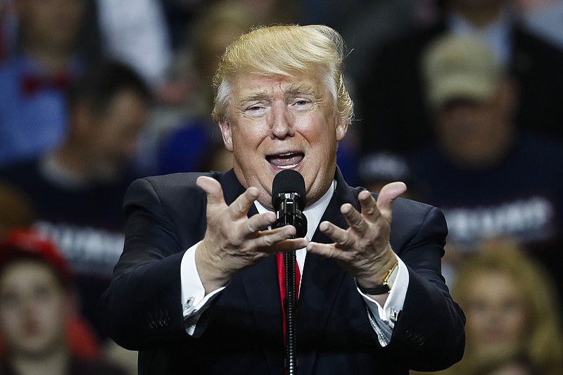 
              President Donald Trump speaks during a rally at the Kentucky Exposition Center, Monday, March 20, 2017, in Louisville, Ky. (AP Photo/John Minchillo)
            