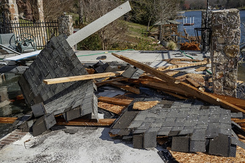 Bobby Keyes's roof was torn from his home on Berkeley Lane on Wednesday, March 22, 2017, in Hixson, Tenn., after Tuesday evening storms caused isolated damage throughout the region.
