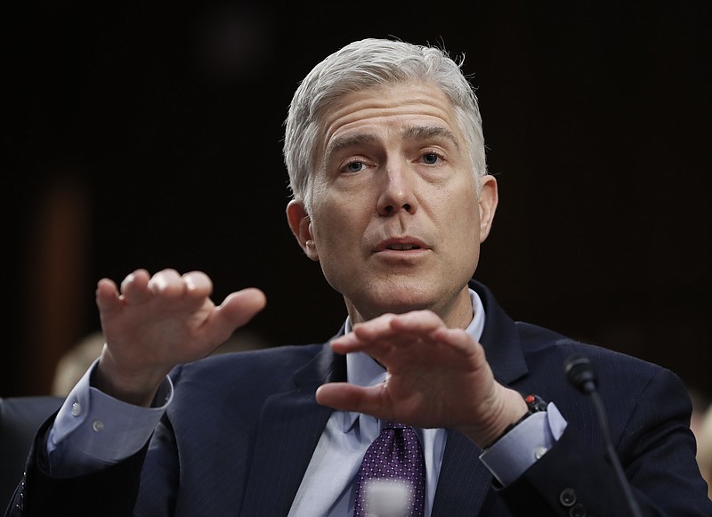 
              Supreme Court Justice nominee Neil Gorsuch gestures as he testifies on Capitol Hill in Washington, Tuesday, March 21, 2017, at his confirmation hearing before the Senate Judiciary Committee. (AP Photo/Pablo Martinez Monsivais)
            