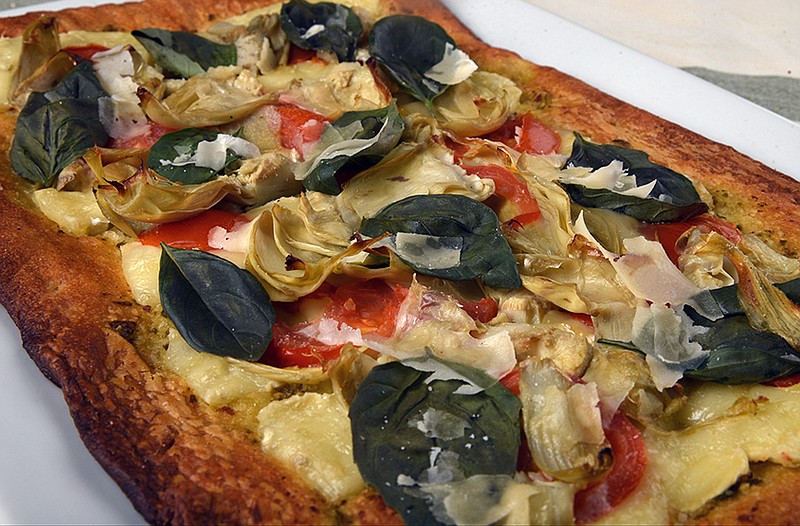 Tomato and artichoke puff pastry pizza