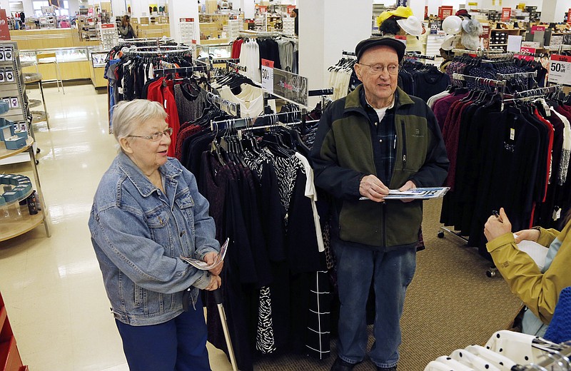 Jack Walsh, 85, and his 82-year-old wife, Mary Ann, visit with a reporter at a Sears store, Wednesday, March 22, 2017, in St. Paul, Minn. They said they have shopped at Sears their entire lives, buying items from curtains and window treatments to tires and tools. (AP Photo/Jim Mone)