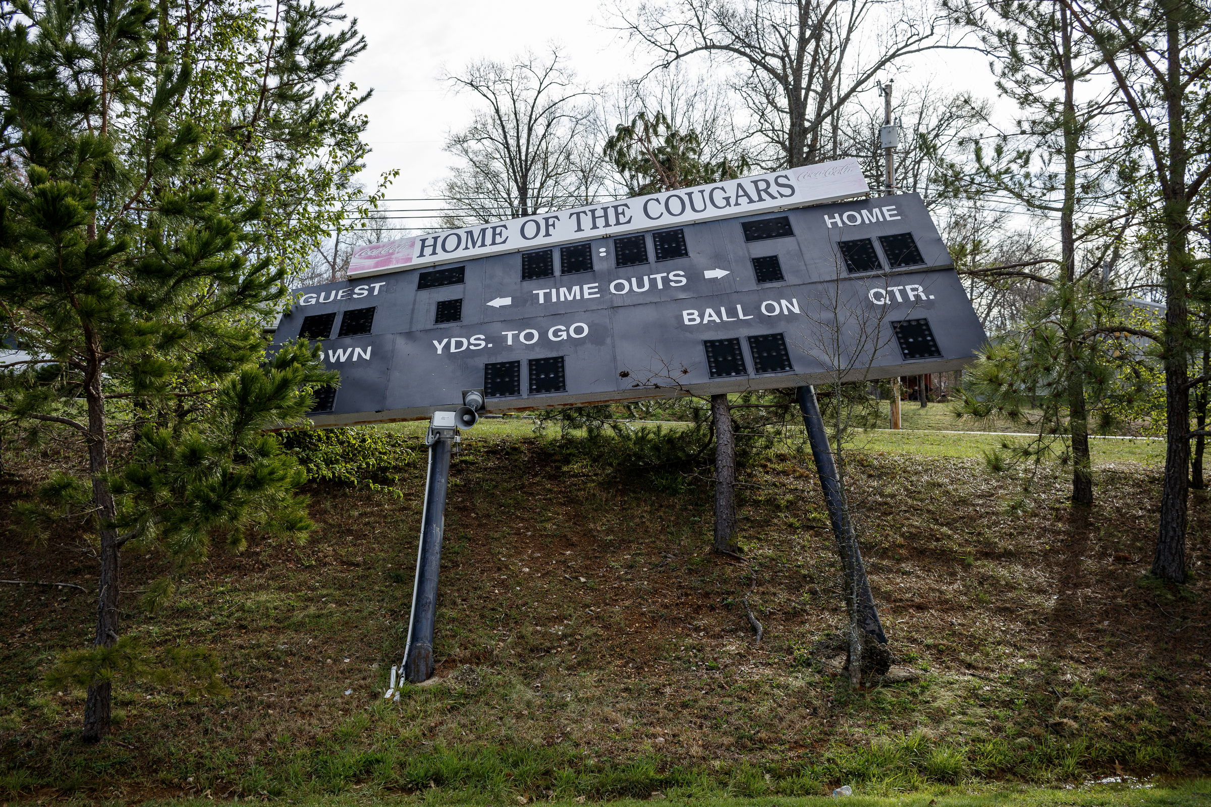 The scoreboard of the Loftis Middle School football field is seen knocked over by wind on Wednesday, March 22, 2017, in Hixson, Tenn., after Tuesday evening storms caused isolated damage throughout the region.