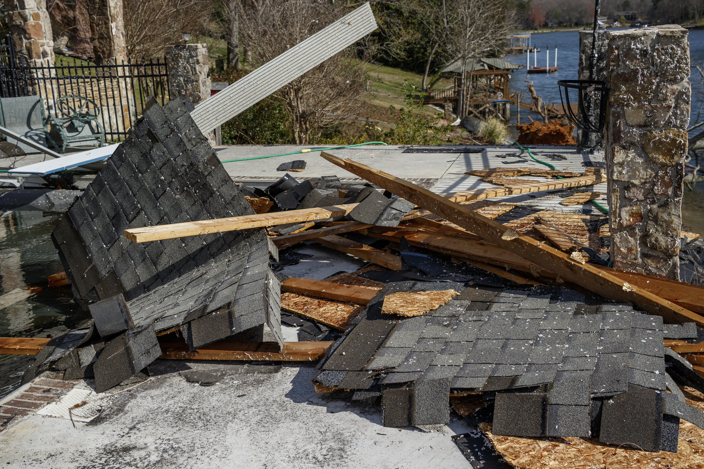 Bobby Keyes's roof was torn from his home on Berkeley Lane on Wednesday, March 22, 2017, in Hixson, Tenn., after Tuesday evening storms caused isolated damage throughout the region.