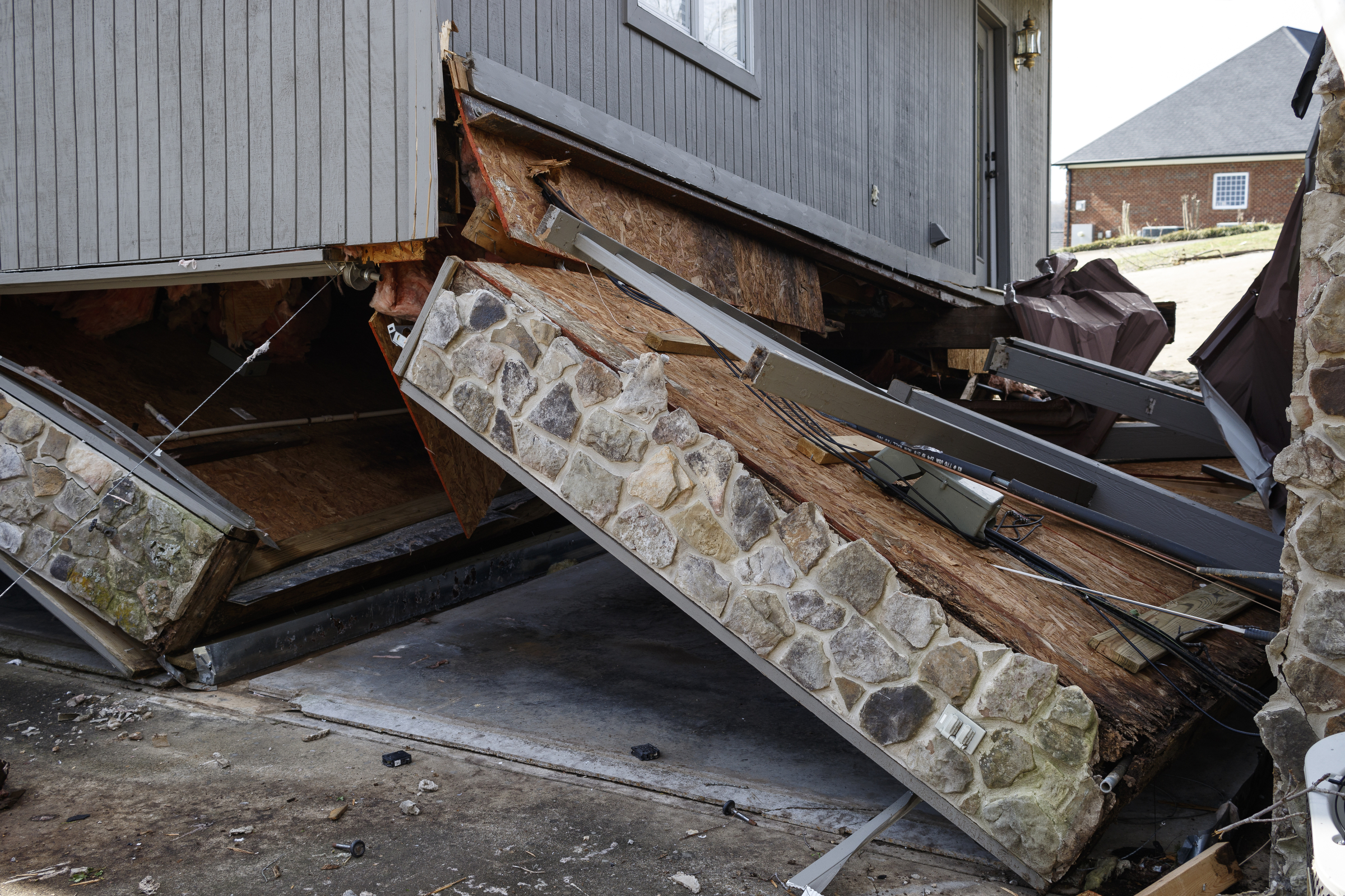 The guest house on Bobby Keyes's property on Berkeley Lane was seen blown off of its foundation on Wednesday, March 22, 2017, in Hixson, Tenn., after Tuesday evening storms caused isolated damage throughout the region.