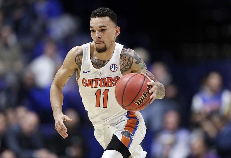 Florida guard Chris Chiozza plays against Vanderbilt during the second half of an NCAA college basketball game at the Southeastern Conference tournament Friday, March 10, 2017, in Nashville, Tenn. (AP Photo/Wade Payne)