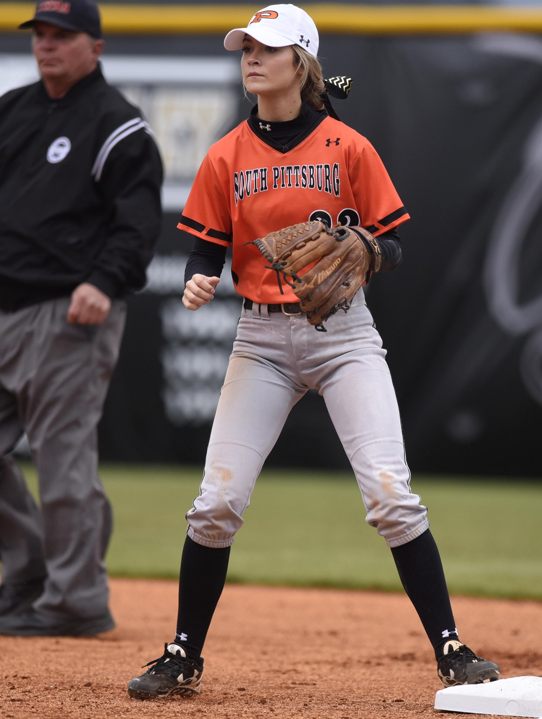 Staff Photo by Robin Rudd South Pittsburg second baseman Victoria Grider (22) covers first base on a play for the Lady Pirates. This is her final season playing softball for her father, Vic.