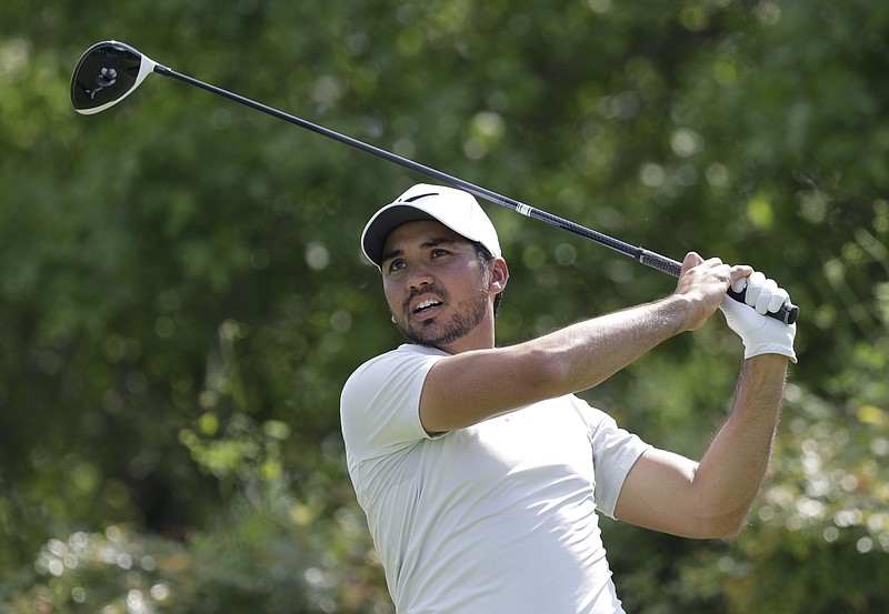 
              Jason Day, of Australia, watches his tee shot on the sixth hole during round-robin play against Pat Perez at the Dell Technologies Match Play golf tournament at Austin County Club, Wednesday, March 22, 2017, in Austin, Texas. Day conceded the match after the sixth hole and withdrew from the tournament. (AP Photo/Eric Gay)
            