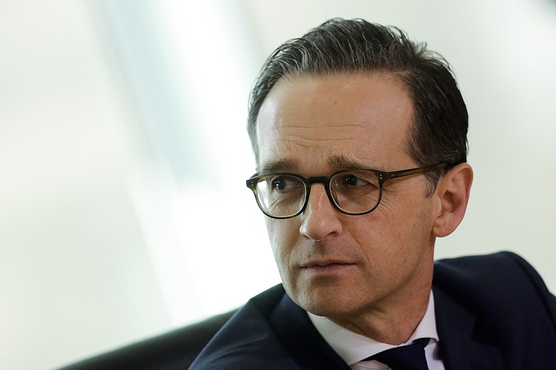 
              German Justice Minister Heiko Maas attends the weekly cabinet meeting of the German government at the chancellery in Berlin, Wednesday, March 22, 2017. Germany’s Cabinet on Wednesday approved a bill that will annul the convictions of thousands of gay men under a law criminalizing homosexuality that was applied zealously in post-World War II West Germany. (AP Photo/Markus Schreiber)
            