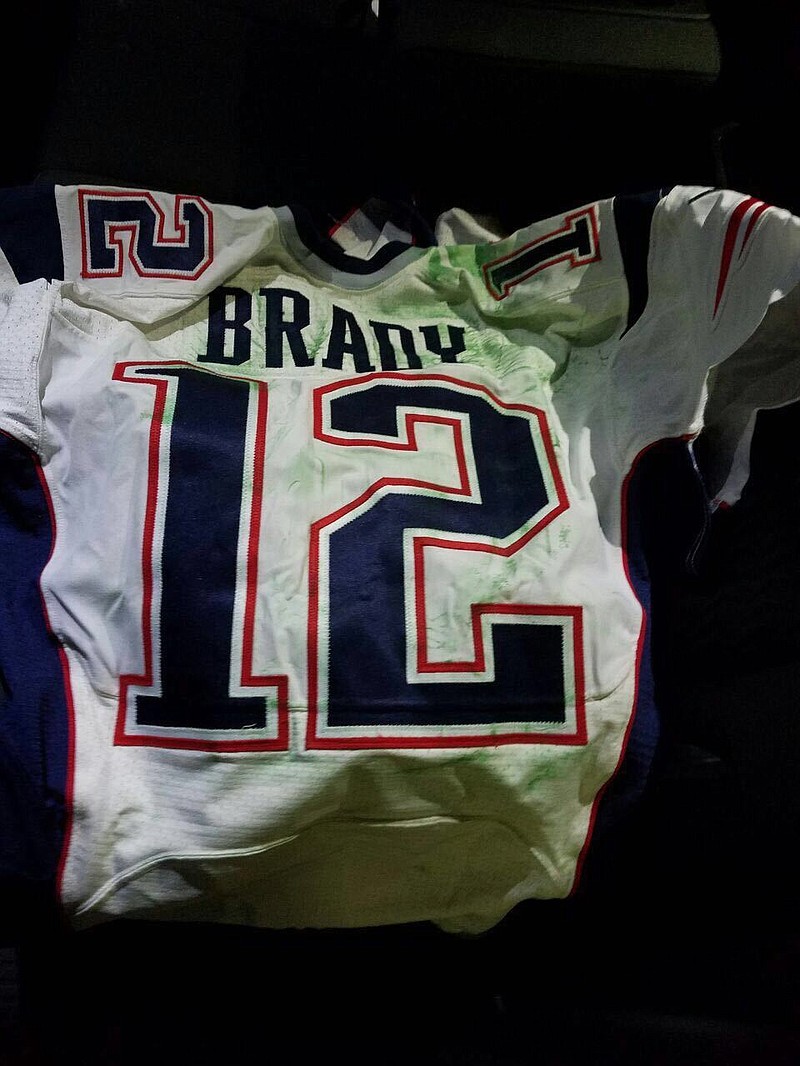 
              This photo released by MAGO on Tuesday, March 21, 2017 shows Tom Brady's Super Bowl LI jersey after it was recovered by authorities in Mexico City. Brady’s jersey went missing from the locker room after the game, and immediately set off an investigation that stretched from Boston to the border. Working with U.S. investigators, Mexican authorities obtained a search warrant and recovered the jersey March 12, along with another Brady jersey that disappeared after the 2015 Super Bowl. The Mexican media executive suspected of stealing Brady’s jersey went to the Super Bowl posing as a working journalist but spent the week collecting selfies and autographs from football greats and boasting to colleagues that he was there as a fan. (MAGO via AP )
            