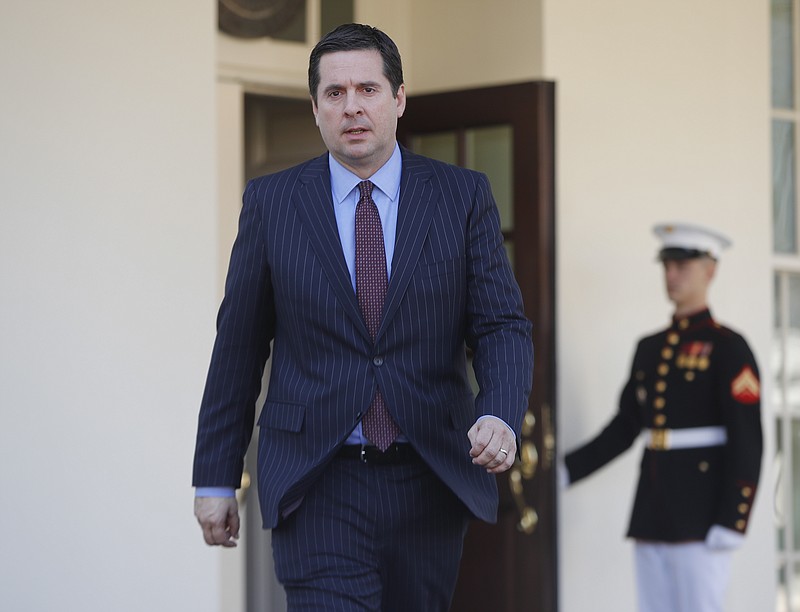 House Intelligence Committee Chairman Rep. Devin Nunes, R-Calif, walks out the White House in Washington, Wednesday, March 22, 2017, to speak with reporters after a meeting with President Donald Trump. (AP Photo/Pablo Martinez Monsivais)