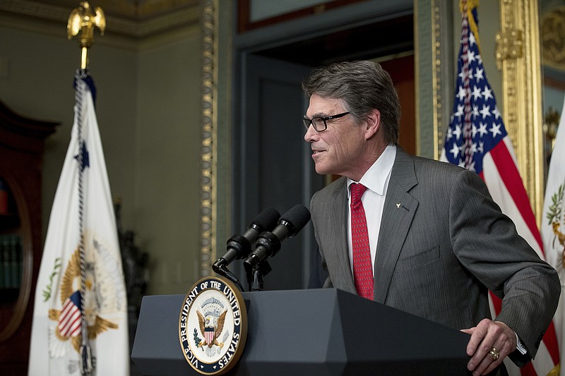 
              FILE - In this March 2, 2017, file photo, Energy Secretary Rick Perry speaks during a swearing in ceremony in the Eisenhower Executive Office Building on the White House complex in Washington. Perry, whose agency oversees the nation’s nuclear arsenal, is inserting himself into an unusually small political dispute: an election for student body president at Texas A&M. In an op-ed submitted to the Houston Chronicle, the former Texas governor suggested that his alma mater’s first openly gay president may have stolen the outcome. Perry wrote that the campus election “at best made a mockery of due process and transparency” and at worst “allowed an election to be stolen outright.” (AP Photo/Andrew Harnik, File)
            