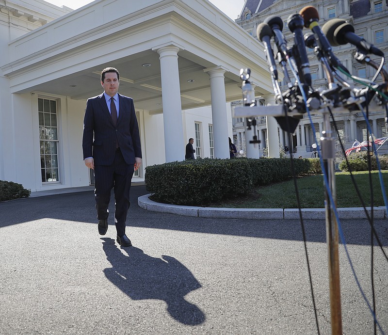 
              House Intelligence Committee Chairman Rep. Devin Nunes, R-Calif, walks out of the White House in Washington, Wednesday, March 22, 2017,
to speak with reporters after a meeting with President Donald Trump. (AP Photo/Pablo Martinez Monsivais)
            