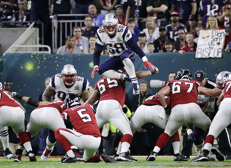 
              FILE - In this Feb. 5, 2017, file photo, New England Patriots' Shea McClellin (58) leaps over the line of scrimmage in an attempt to block a kick during the first half of the NFL Super Bowl 51 football game in Houston. NFL owners will consider proposals next week to cut regular-season overtime from 15 minutes to 10; eliminate players leaping over the line on kick plays; and expansion of coaches' challenges and what can be reviewed by officials.   (AP Photo/Jae C. Hong, File)
            