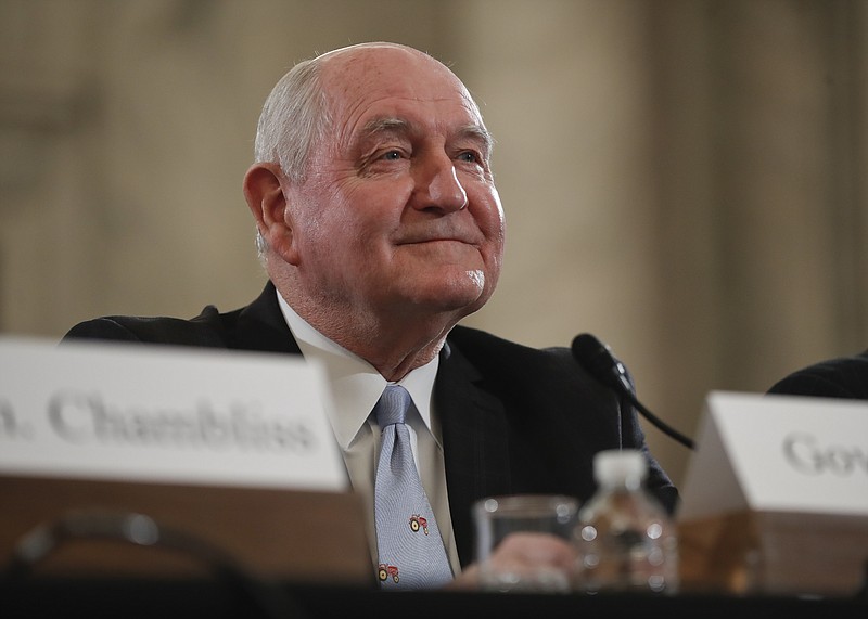 
              Agriculture Secretary-designate, former Georgia Gov. Sonny Perdue arrives on Capitol Hill in Washington, Thursday, March 23, 2017, to testify at his confirmation hearing before the Senate Agriculture, Nutrition and Forestry Committee.  (AP Photo/Pablo Martinez Monsivais)
            