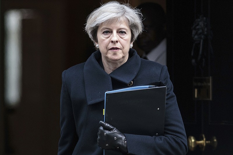 Britain's Prime Minister Theresa May leaves 10 Downing Street in London on her way to parliament, Thursday March 23, 2017, following the attack in London Wednesday. On Wednesday a man went on a deadly rampage, first drove a car into pedestrians then stabbed a police officer to death before being fatally shot by police within Parliament's grounds in London. ( Jack Taylor/Pool via AP)