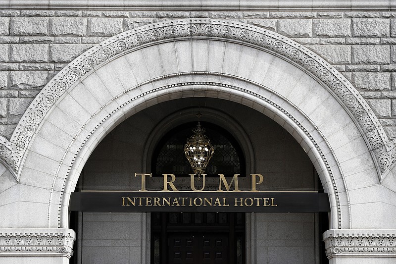 
              FILE - In this Dec. 21, 2016 file photo, the Trump International Hotel in Washington. The federal agency overseeing Donald Trump’s lease for a luxury hotel in Washington has ruled his election as president doesn’t violate the terms of his agreement barring government officials from profiting from the property. (AP Photo/Alex Brandon, File)
            
