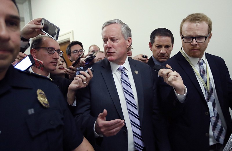 
              House Freedom Caucus Chairman Rep. Mark Meadows, R-N.C. speaks with the media on Capitol Hill in Washington, Thursday, March 23, 2017, following a Freedom Caucus meeting. GOP House leaders delayed their planned vote on a long-promised bill to repeal and replace "Obamacare," in a stinging setback for House Speaker Paul Ryan and President Donald Trump in their first major legislative test.  (AP Photo/Alex Brandon)
            