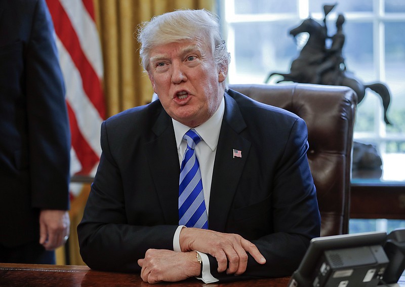 
              President Donald Trump about the health care overhaul bill, Friday, March 24, 2017, in the Oval Office of the White House in Washington. rump says he would be willing to reopen negotiations for a health care bill with Democrats if the Affordable Care Act fails.

(AP Photo/Pablo Martinez Monsivais)
            